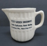 Peter Kirsch Hardware advertising stoneware cream pitcher, 4 1/2