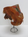 Lovely pheasant feather vintage hat, interesting shape on metal stand
