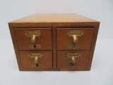 Four drawer maple card file cabinet, Gaylord Bros Inc