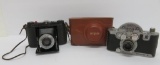 Three vintage film cameras, Argus, Mercury II and Ansco