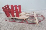 Wooden child's sled, 35
