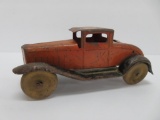 Early tin car with rumble seat, 8