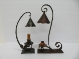 Two Arts and Crafts copper toned metal candle sticks with smoke bells, 11