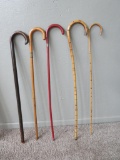 Five vintage wooden canes, about 37