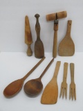Assorted wooden utensils, paddles, spoons, fork, nine pieces