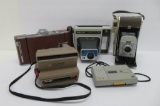 4 Assorted Polaroid cameras