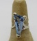 10kt white gold solitaire ring set with a blue triangular step cut created glass stone