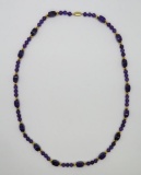 Amethyst beaded necklace with 14kt yellow gold beads, 25