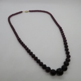 Multi facet graduated beaded necklace, amethyst colored glass beads, 25 1/2