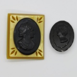 Bakelite and black glass cameo pins, 2 1/4