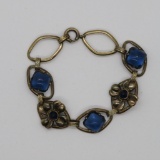 Sterling bracelet with blue stone insets, 6 1/2