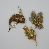 Three rhinestone pins, fish, butterfly and flower, 2