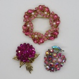 Three lovely pink rhinestone pins, Trifari and Lisner