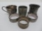 Five silverplate napkin rings and handled toothpick holder
