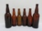 Six amber embossed, Milwaukee Waukesha Brew Co bottles, 11 1/2