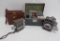 Three vintage 8 mm movie cameras, Bell & Howell, Yashika and Revere