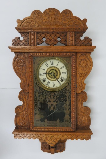 Sessions carved wall clock, 27", with key and pendulum