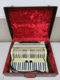 Morbidoni accordion with case, 18