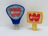 Two Weber beer tap handles, 3