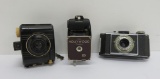 Three vintage cameras, Baby Brownie, Kodak Bantam and Hollywood
