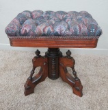 Ornate upholstered walnut piano stool, adjustable