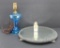 Vintage plateau mirror, perfume and blue bedroom lamp
