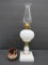 Milk glass oil lamp and copper lustre creamer