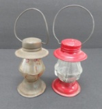 Two glass railroad lantern candy containers, 4