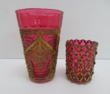 Two cranberry glass pieces with metal ornate overlay, toothpick holder and glass
