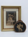 Framed print of woman and dog and travel case