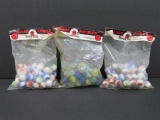Three sealed packages of Marble King marbles, 60 count each