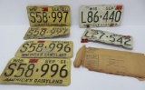 Six vintage Wisconsin license plates, 1960 and 1961