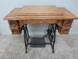 Oak treadle sewing machine cabinet, five drawer
