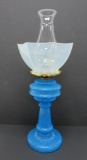 Blue speckled oil lamp base with opalescent shade and chimney