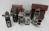 Five vintage 8 mm cameras with two cases