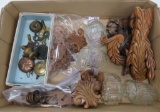 Assorted wood carvings, clock keys, pendulums and bird cage waterers