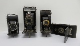 Four vintage Kodak folding cameras