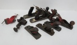 6 Assorted old metal planes and two small vises