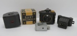 Small and miniature cameras, four pieces