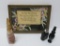 Three vintage perfumes and motto framed art by Bronson