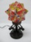 Art Deco lamp, three kneeling nudes with modernistic multi colored shade, 12