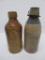 Two stoneware bottles, EL Hustings Milwaukee and AJM