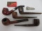 Five vintage Dr Graybow and Seville pipes, Medico filters and cigar cutter, 5 1/2