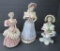 Three large lacey Corday figures, woman, 9 1/2