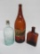 Three vintage beer and liquor bottles