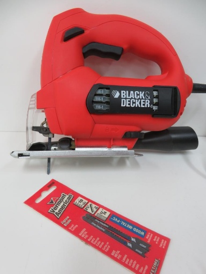 Black and Decker jig saw with case, working