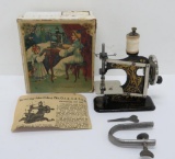 Antique Little Beauty children's sewing machine in original graphic box, #3504/2818