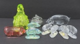 Mosser and Summit art glass figures, 8 pigs, covered bunny dish and Sun Bonnet girl