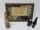 Three vintage perfumes and motto framed art by Bronson