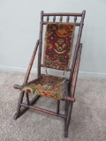 Tapestry covered child's rocker, 29